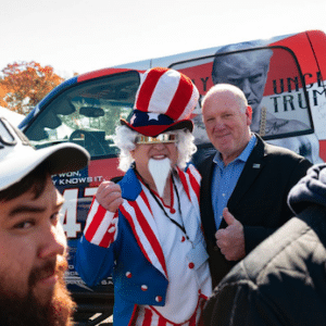 MR Online | Zach Roberts Tom Homan poses for photos at the Rod of Iron Gun Festival run by Pastor Sean Moon October 2024 | MR Online